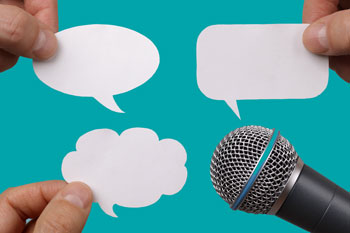 Sprechblasen mit Mikrofon